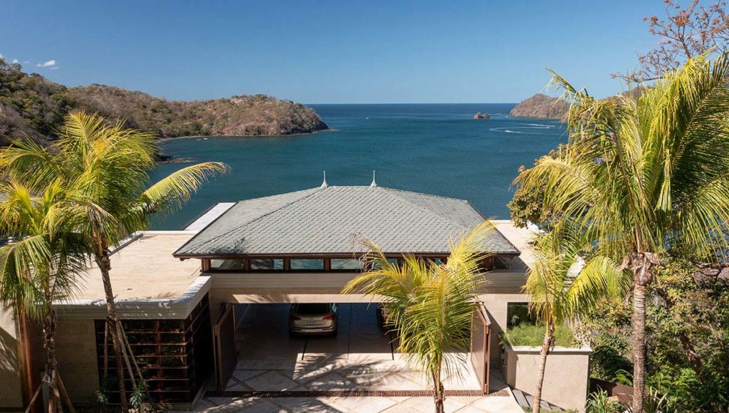 Aerial shot of The Hive Residence on the shore